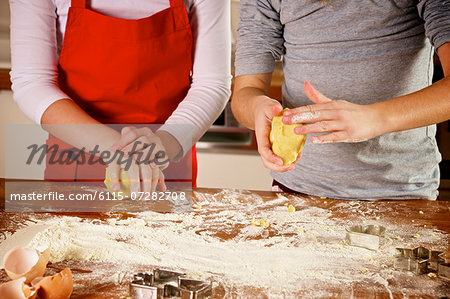 Children making Christmas cookies, Munich, Bavaria, Germany