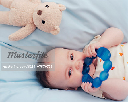 Baby Boy Lying in Bed, Munich, Bavaria, Germany, Europe