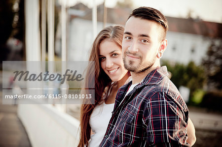 Portrait of happy young couple