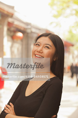 Young Woman smiling looking up