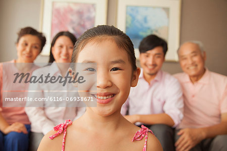 Multigenerational family smiling, portrait