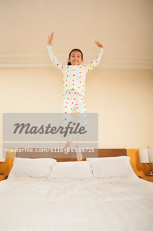 Kid Jumping on Bed