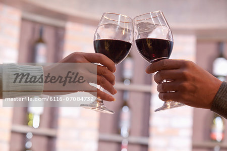 Close Up of Couple Toasting, Hands and Wineglass only