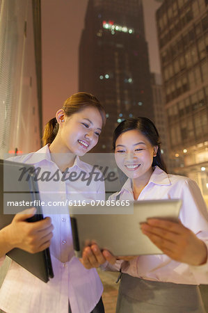 Young businesswomen working outdoor