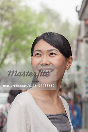 Young Woman smiling looking away