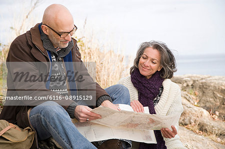 Mature couple looking at a map