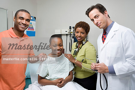 Girl with parents and doctor