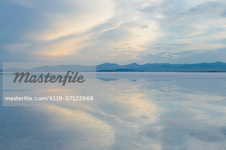 Shallow Water Over The Surface At The Bonneville Salt Flats Near Wendover, At Dusk.