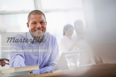 Office Life. A Man In A Blue Shirt.