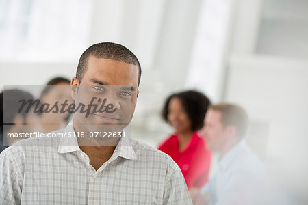 Business Meeting. A Man Smiling Confidently.