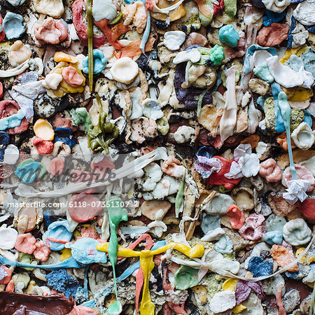 Close up of chewed bubble gum stuck on The Gum Wall in Pike Place market in Seattle.