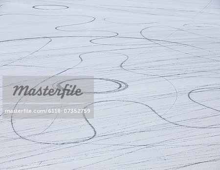 Tyre marks and tracks in the playa salt pan surface of Black Rock Desert, Nevada.