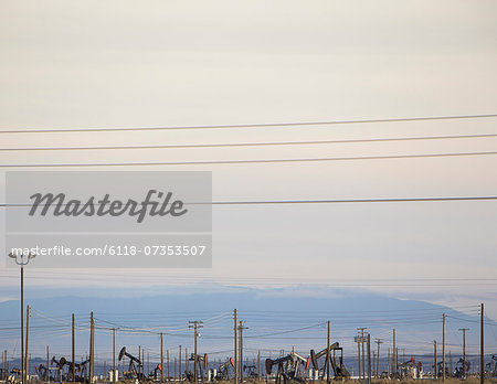 Oil rigs and power lines in the Midway-Sunset oil fields, the largest in California