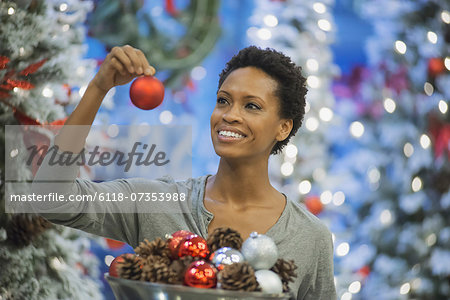 Woman at home decorating for Holidays