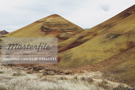 The Painted Hills desert and landscape, coloured layered geological strata in the John Day Fossil Beds National Monument, Oregon