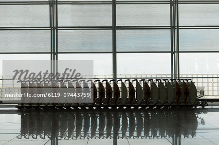 Baggage carts in an airport, Prague, Czech Republic, Europe