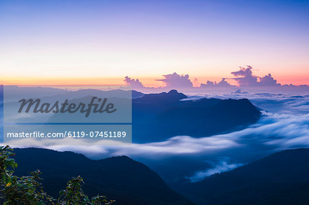 View of mountains from the 2443m summit of Adams Peak (Sri Pada) at sunrise, Central Highlands, Sri Lanka, Asia