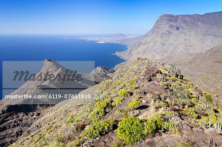 Rocky coastline, Anden Verde, West Coast with Puerto de las Nieves and Faneque Mountain, Tamadapa Natural Park, Gran Canaria, Canary Islands, Spain, Atlantic, Europe