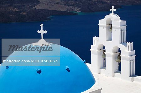 St. Gerasimos Church with blue dome overlooking the Aegean Sea, Firostefani, Santorini, Cyclades, Greek Islands, Greece, Europe