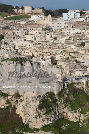 View of Chiesa di San Pietro Caveoso in the Sassi area of Matera and the ravine, Basilicata, Italy, Europe