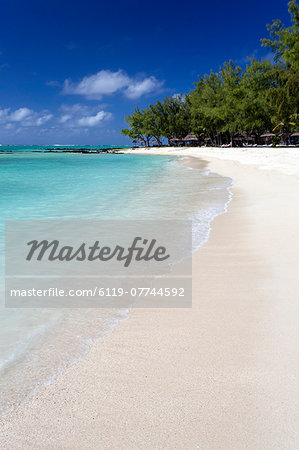 Idyllic beach scene with blue sky, aquamarine sea and soft sand, Ile Aux Cerfs, Mauritius, Indian Ocean, Africa