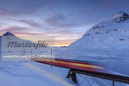 The Bernina Express red train, UNESCO World Heritage Site, Graubunden, Swiss Alps, Switzerland, Europe