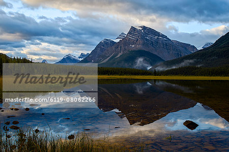 Mountain reflected in Waterfowl Lake at sunrise, Banff National Park, UNESCO World Heritage Site, Alberta, Rocky Mountains, Canada, North America