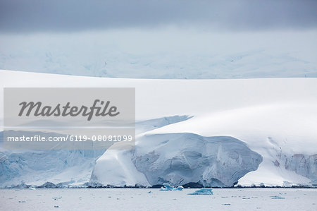 Snow covered mountains and glaciers in Dallmann Bay, Antarctica, Polar Regions