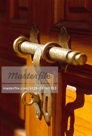 Close-up of a brass latch on a door, Morocco