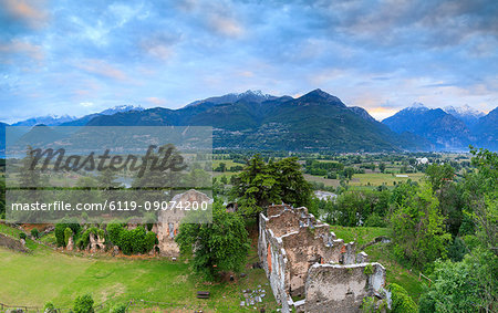 Panorama of ancient ruins of Fort Fuentes framed by green hills at dawn, Colico, Lecco province, Valtellina, Lombardy, Italy, Europe