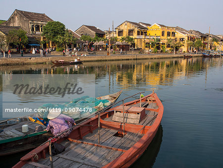 Boats and yellow houses along the river, Waterfront, Hoi An, Vietnam, Indochina, Southeast Asia, Asia