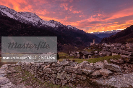 Fiery sky at sunset, Soglio, Bregaglia Valley, Maloja Region, Canton of Graubunden (Grisons), Switzerland, Europe