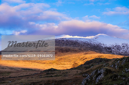 Late afternoon view to snow capped Mount Snowdon in winter in Snowdonia National Park, Rhyd Ddu, Gwynedd, Wales, United Kingdom, Europe