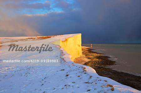 Snow covered Beachy Head and Lighthouse, Eastbourne Downland Estate, Eastbourne, East Sussex, England, United Kingdom, Europe