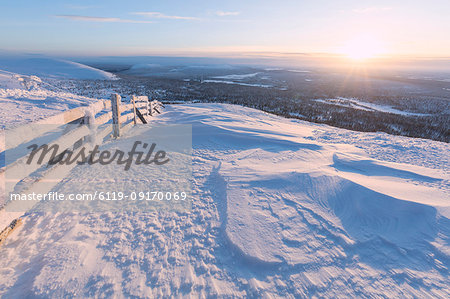 Frozen fence in the snow, Pallas-Yllastunturi National Park, Muonio, Lapland, Finland, Europe