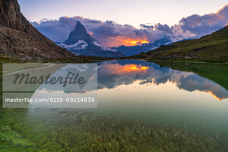 Sunset over the Matterhorn reflected in lake Riffelsee, Zermatt, canton of Valais, Swiss Alps, Switzerland, Europe