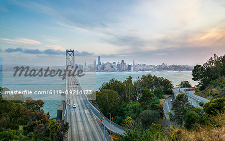 View of San Francisco skyline and Oakland Bay Bridge from Treasure Island at sunset, San Francisco, California, United States of America, North America