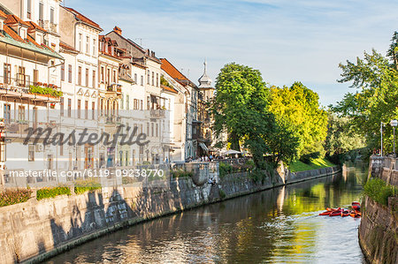 Houses line the Sava River, Ljubljana, Slovenia, Europe