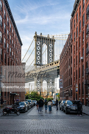 Manhattan Bridge with the Empire State Building through the Arches, seen from Washington Street in Brooklyn, New York, United States of America, North America