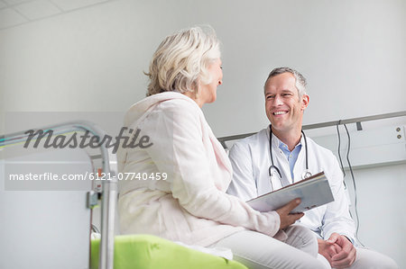 Doctor listening to patient