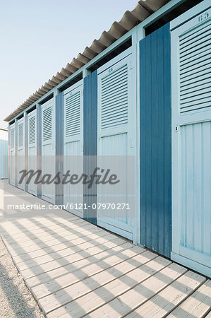 In a row changing cubicle beach summer Italy blue In a row changing cubicle beach summer Italy blue