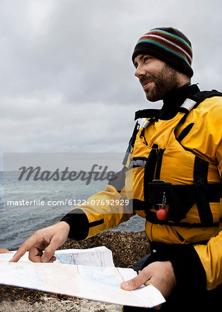 Man looking at map