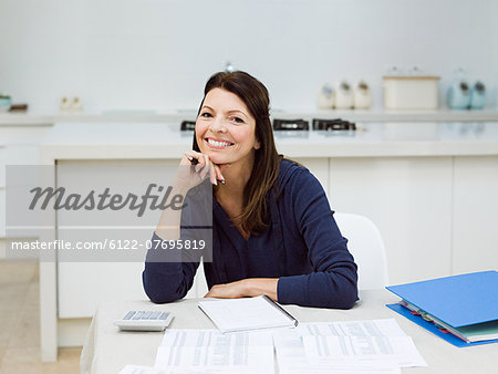 Mature woman doing her finances