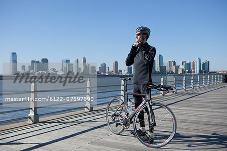 Man doing up bike helmet strap