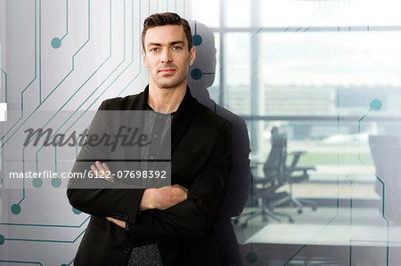 Portrait of young man in IT office