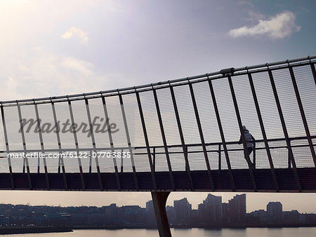 Man running on skybridge