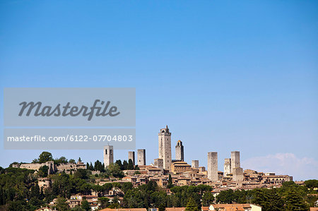 City on hillside in rural landscape