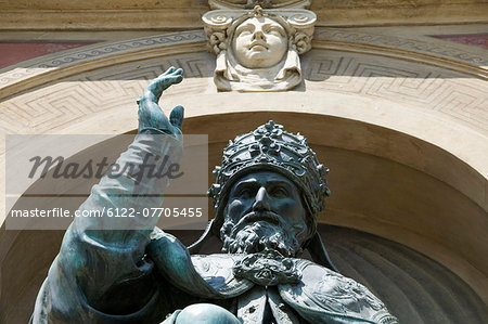 Ornate statue in archway