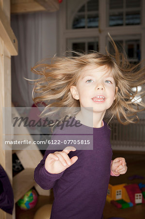 Girl dancing in bedroom