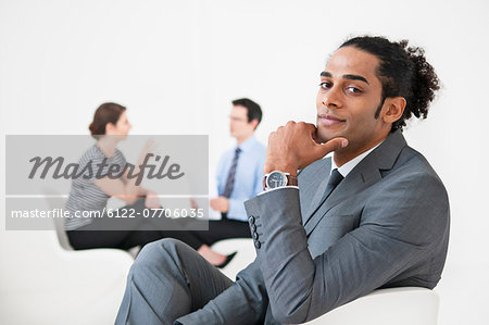 Businessman smiling in lobby area